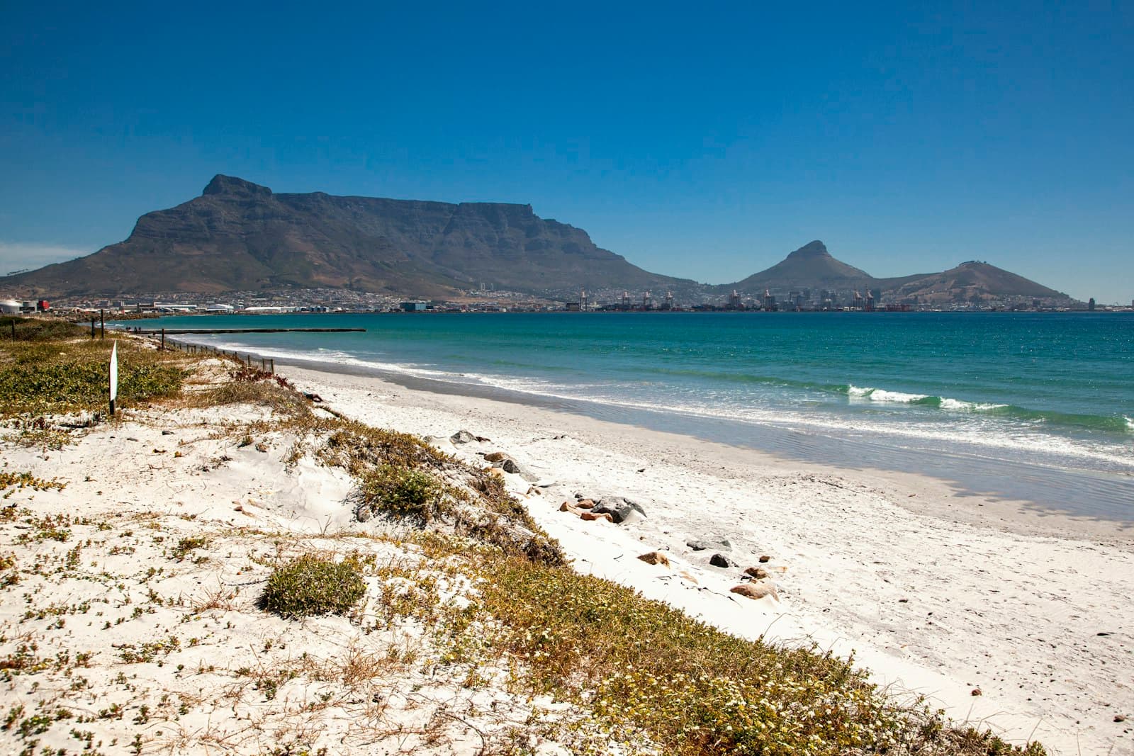 Beach and the ocean with Table Mountain in the distance, Cape Town