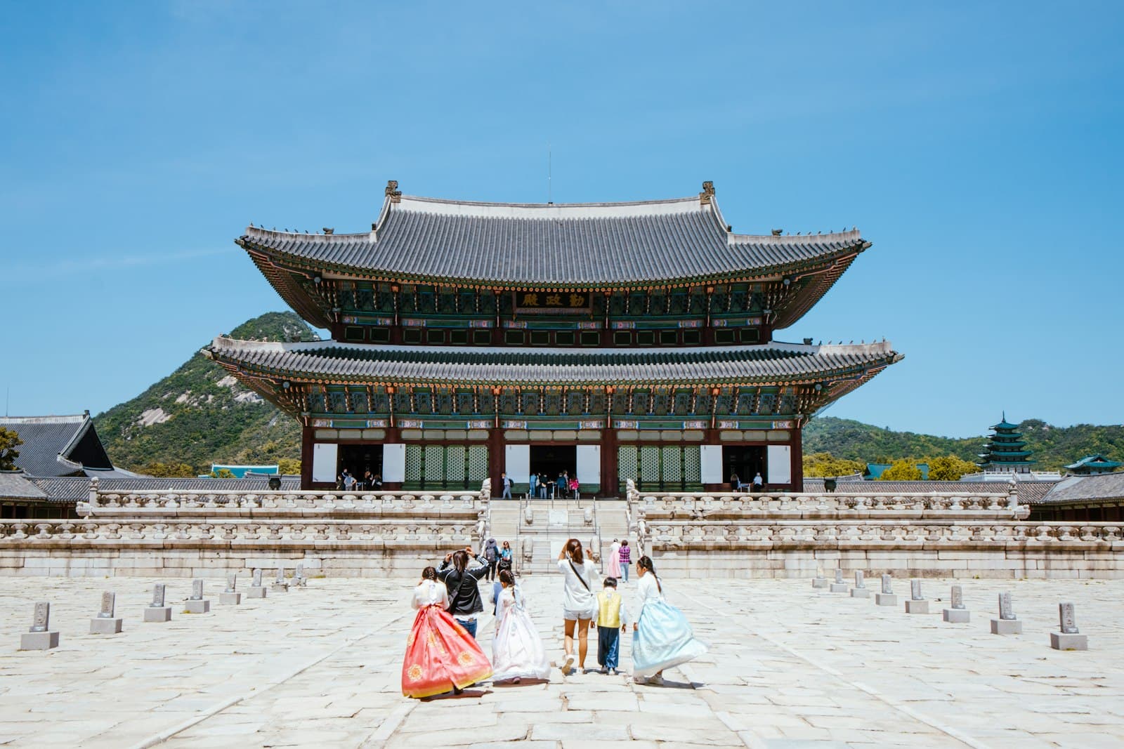 Travelers in hanbok at Gyeongbokgung Palace in Seoul